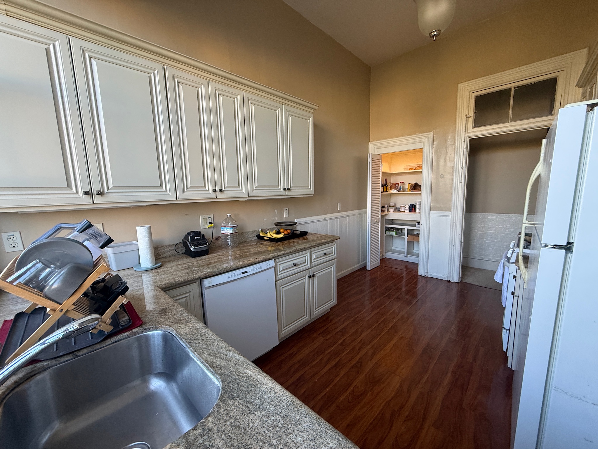 Kitchen with pantry and granite countertops