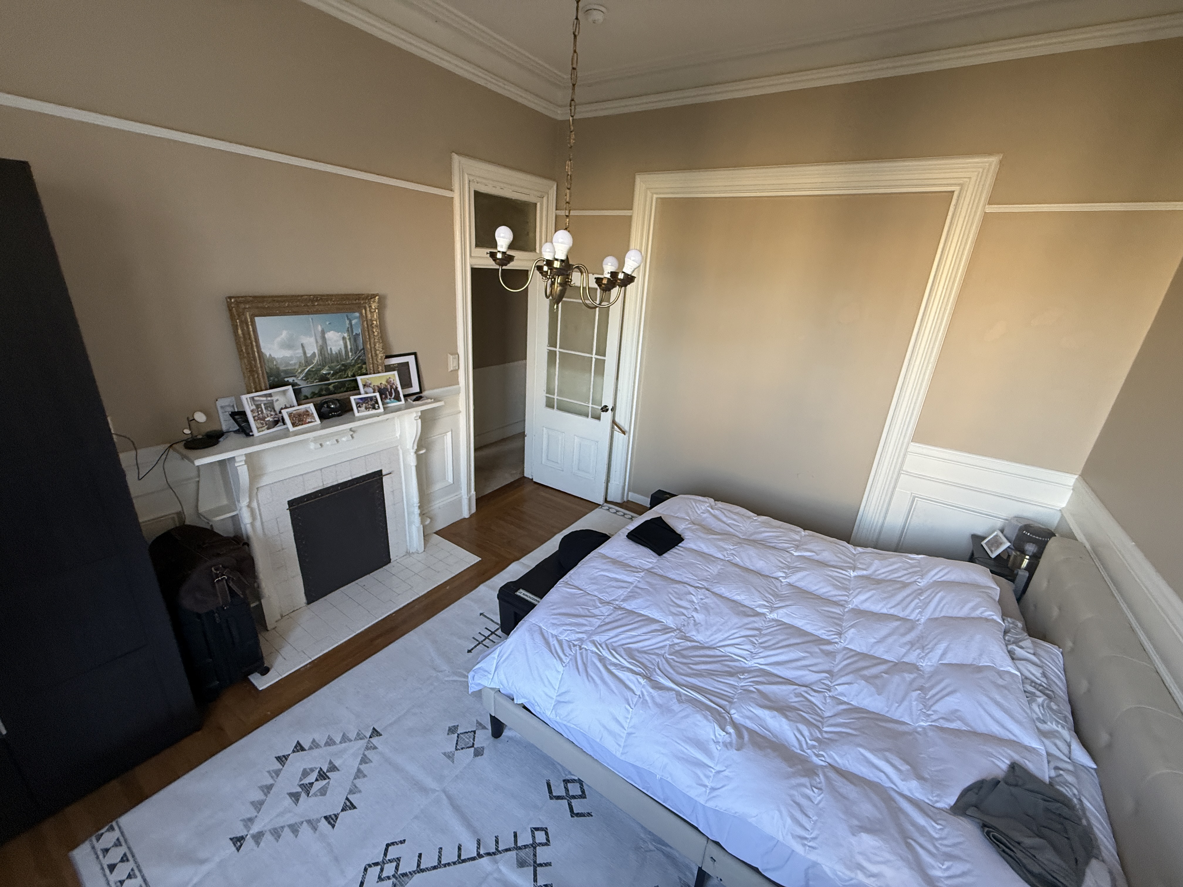 Painted Ladies Suite with fireplace and french door