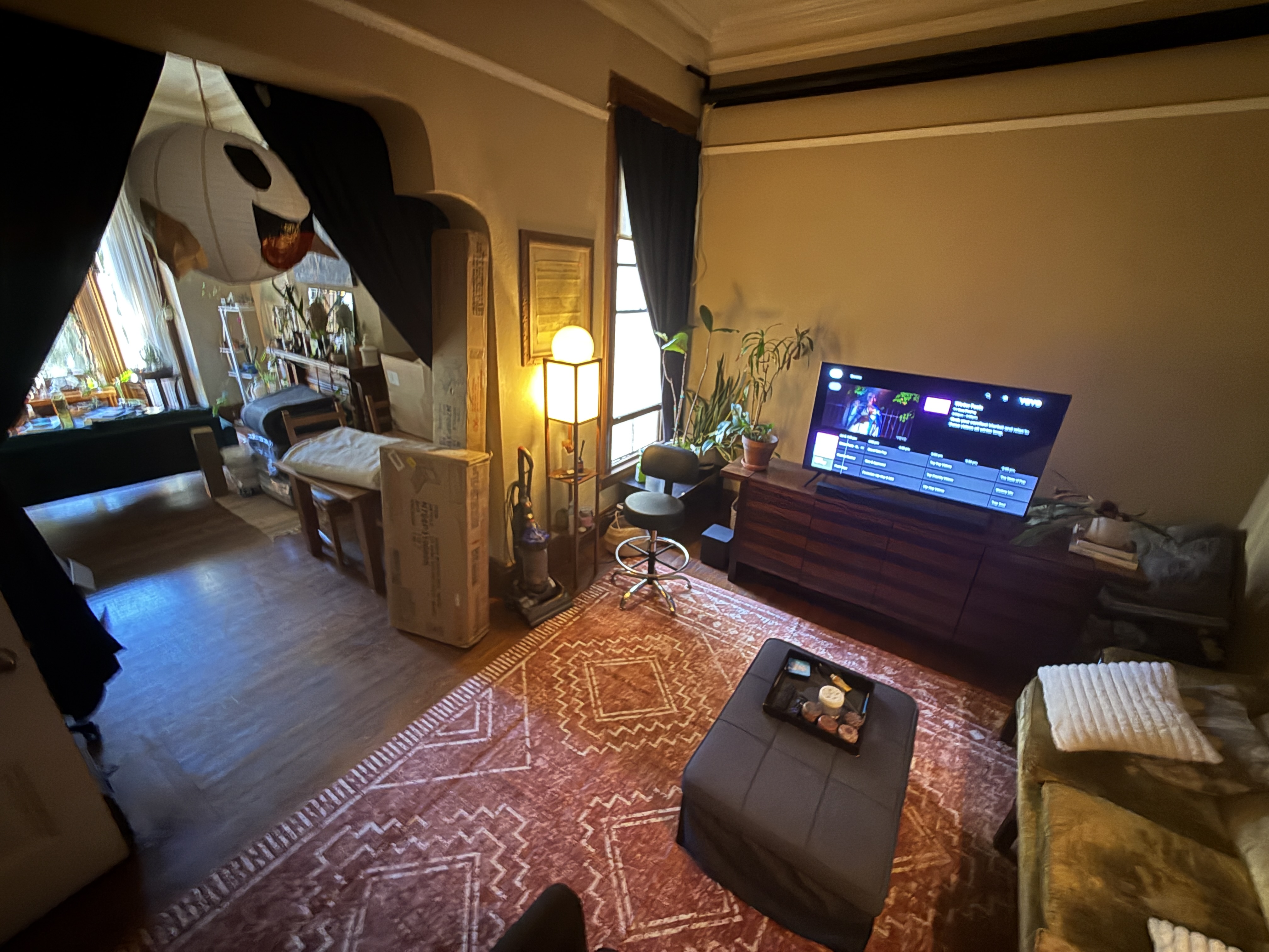 Living room with ghost decoration and warm lighting