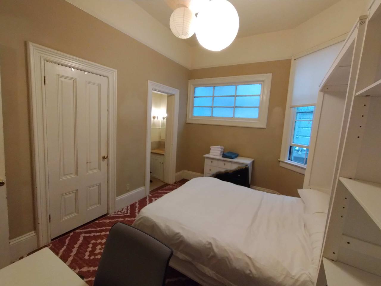 Murphy bed room with two windows